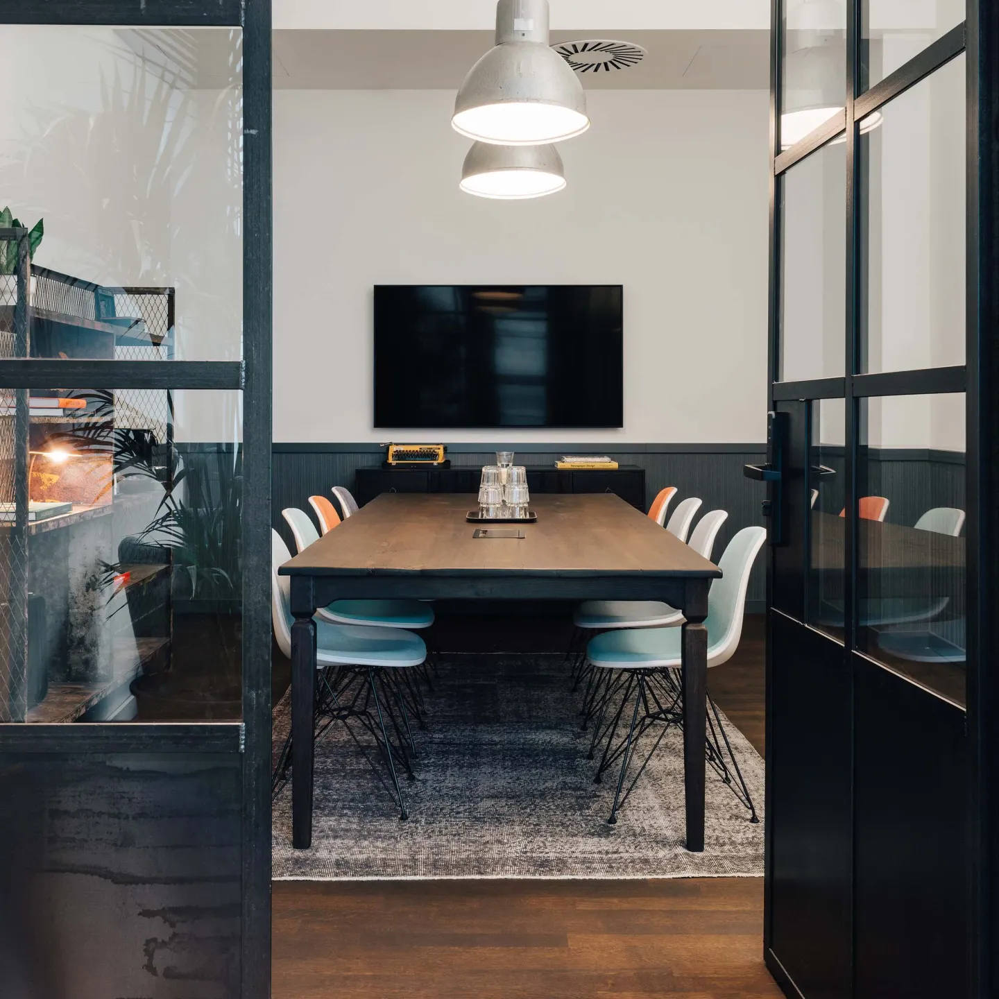 Meeting room behind a glass wall